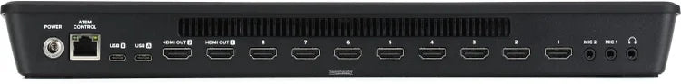 Back view of a computer docking station with multiple ports.