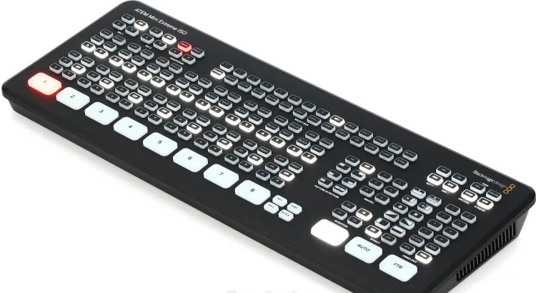 Black keyboard with various buttons on a white background