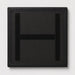 A square black padded patch with a stitched border and a large embroidered letter H in the center, shown on a light gray background.